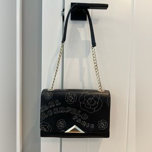 Karl Lagerfeld Leather shoulder bag with white stitching and gold hardware.